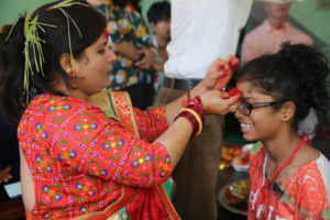 HCC Nepal Hira Decorating Girls Head